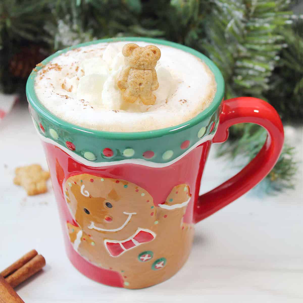 Gingerbread Latte with whipped cream and gingerbread man.