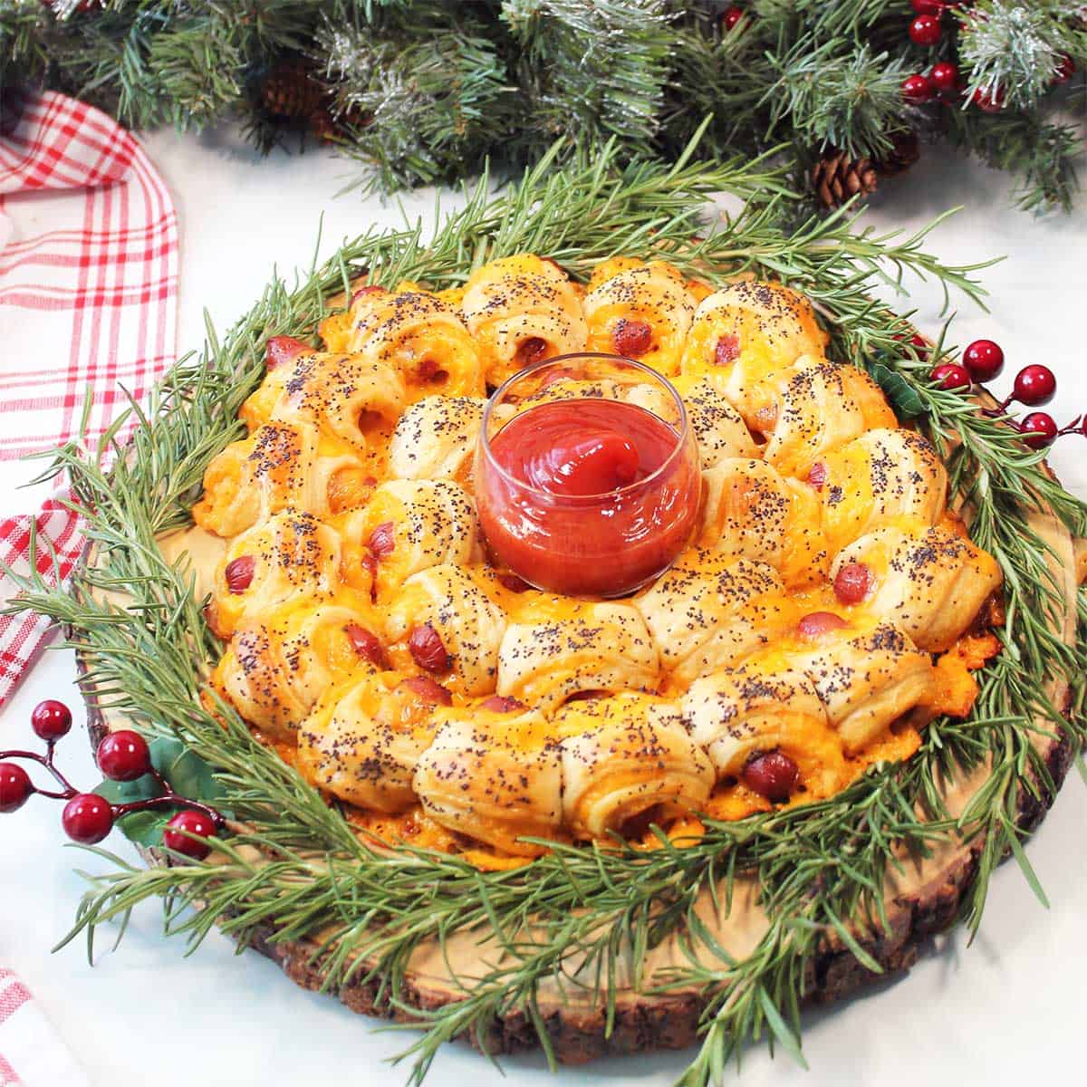 Pigs in a Blanket Wreath decorated for Christmas/