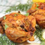 Closeup of air fryer Cornish hen.