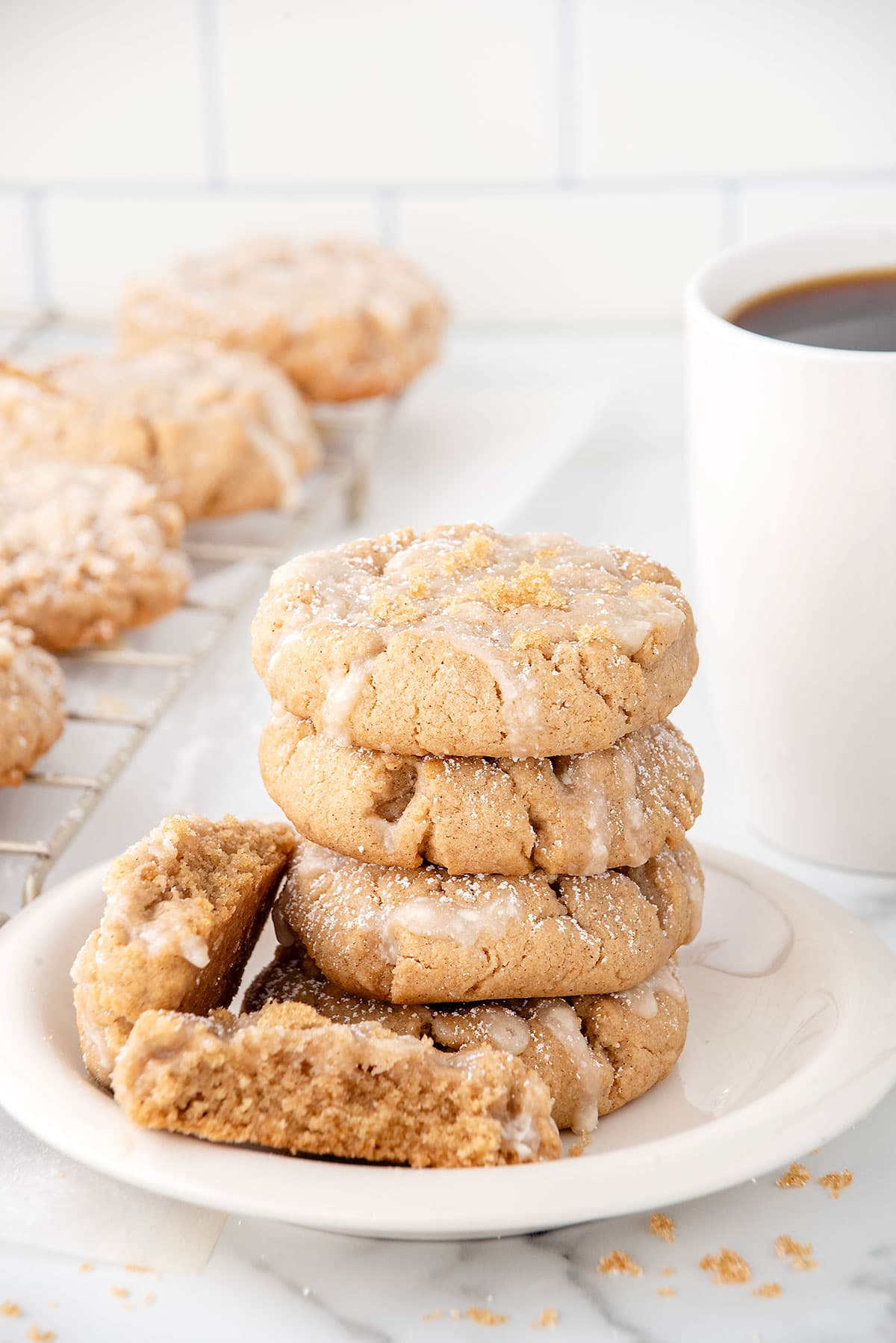 Coffee Cake Cookies plated with cup of coffee.