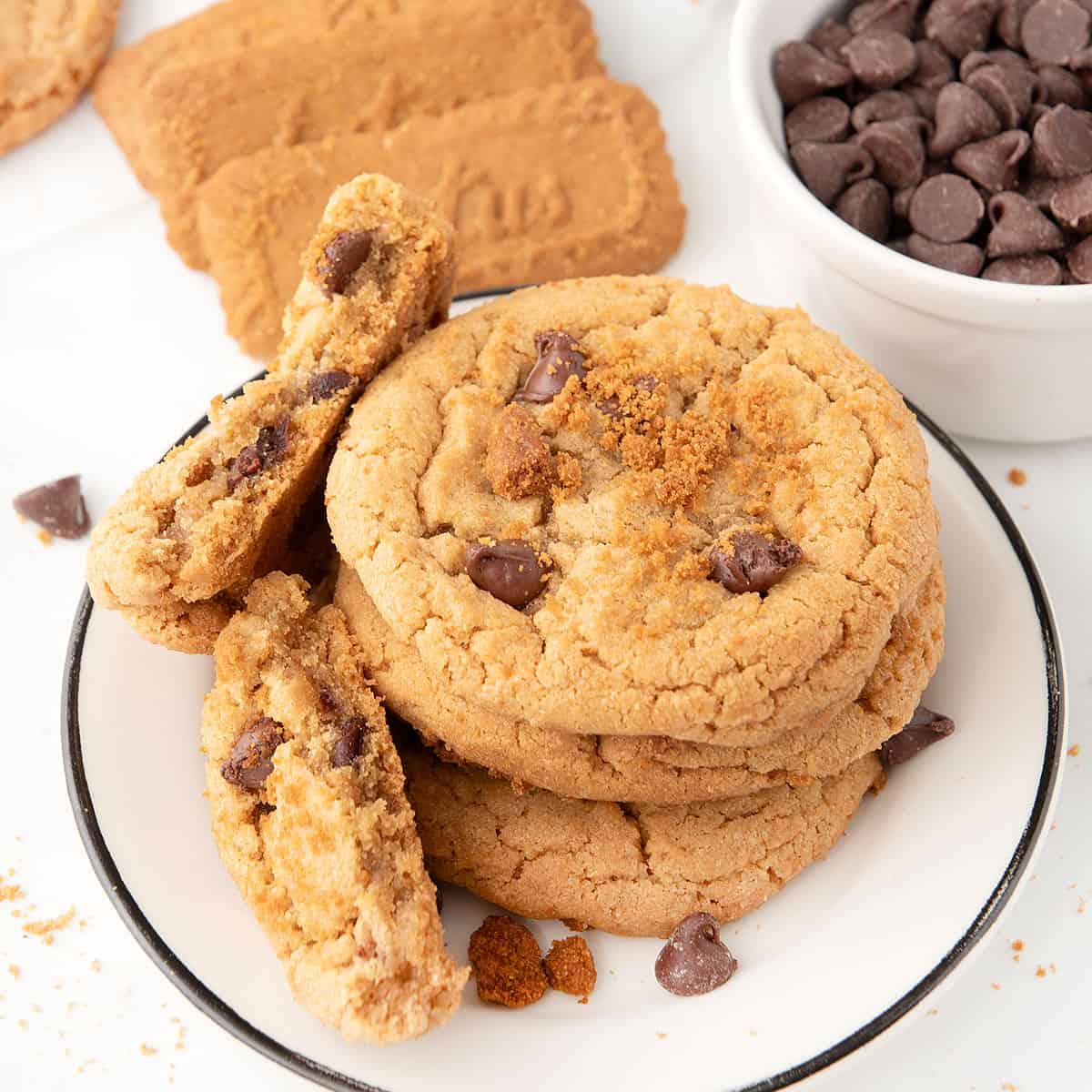 Plated cookie butter cookies with one halved.