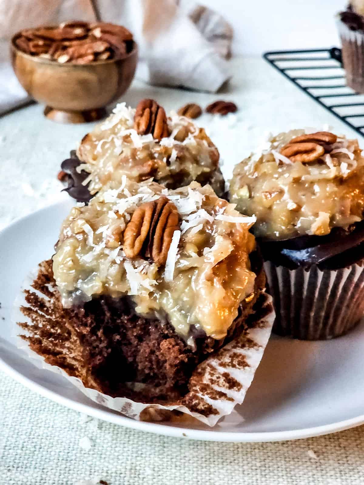 Chocolate cupcake with bite out.