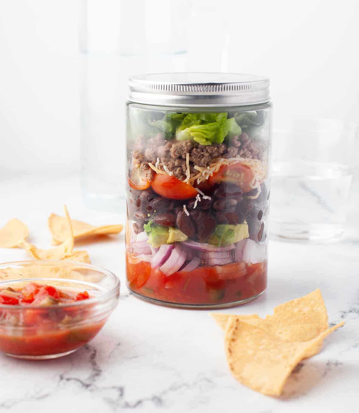 Finished salad in jar with lid on.
