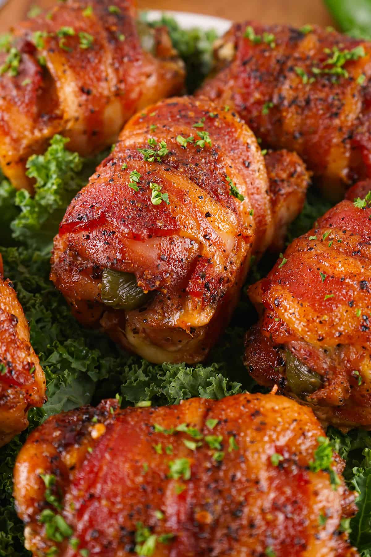 Smoked chicken thighs on platter.