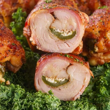 Halved chicken thigh showing inside filling.