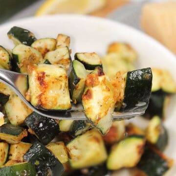 Bite of air fried zucchini on fork.
