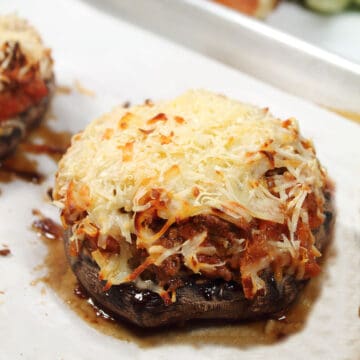 Closeup of baked stuffed mushroom.