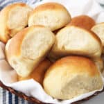 Air Fryer Dinner Rolls in basket closeup.