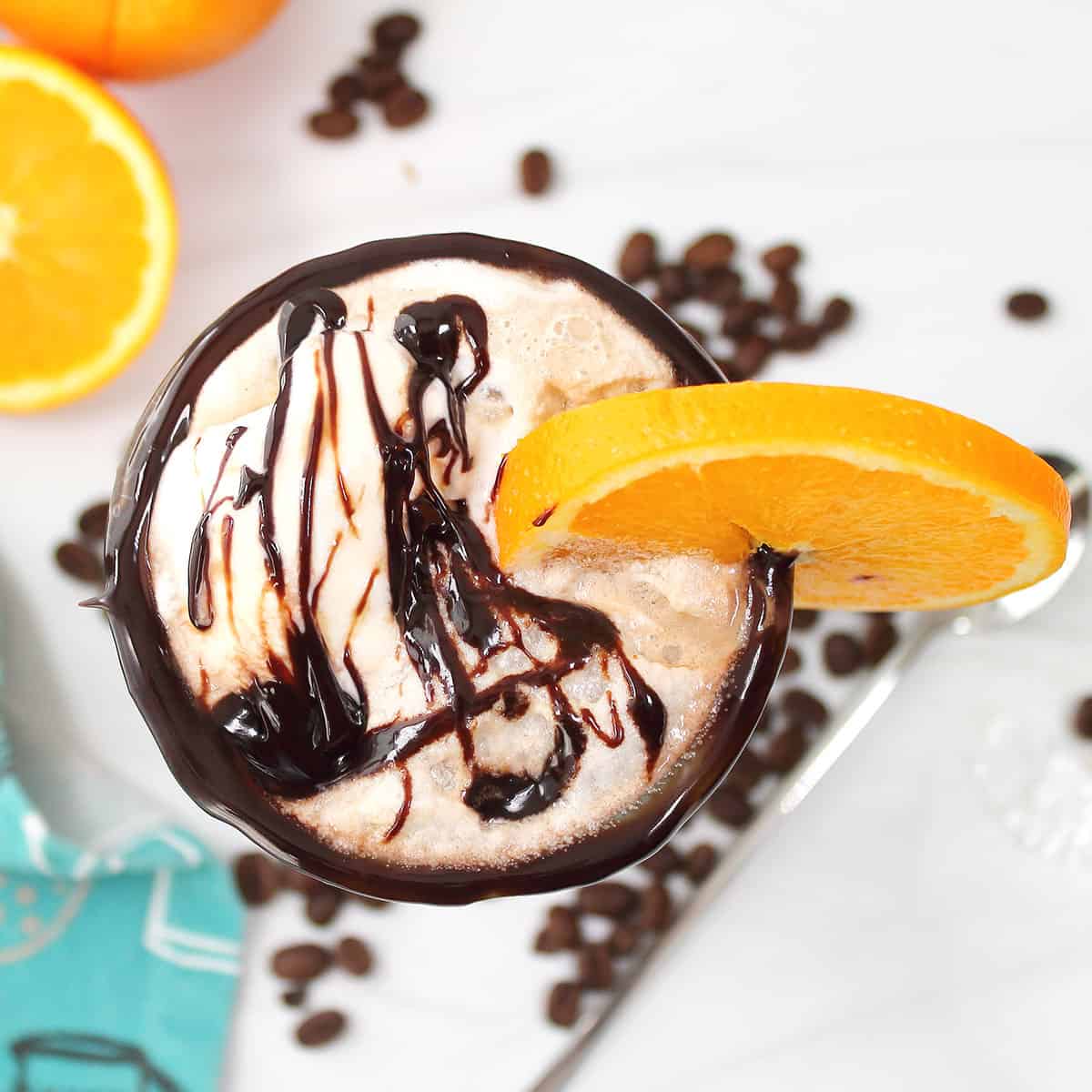 Overhead of cold brew float with chocolate drizzle.