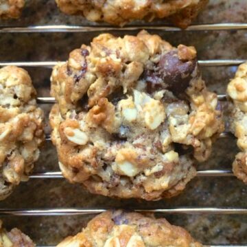 Closeup of back to school cookies on wire rack.