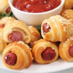 Closeup of pigs in blanket straight out of the air fryer.
