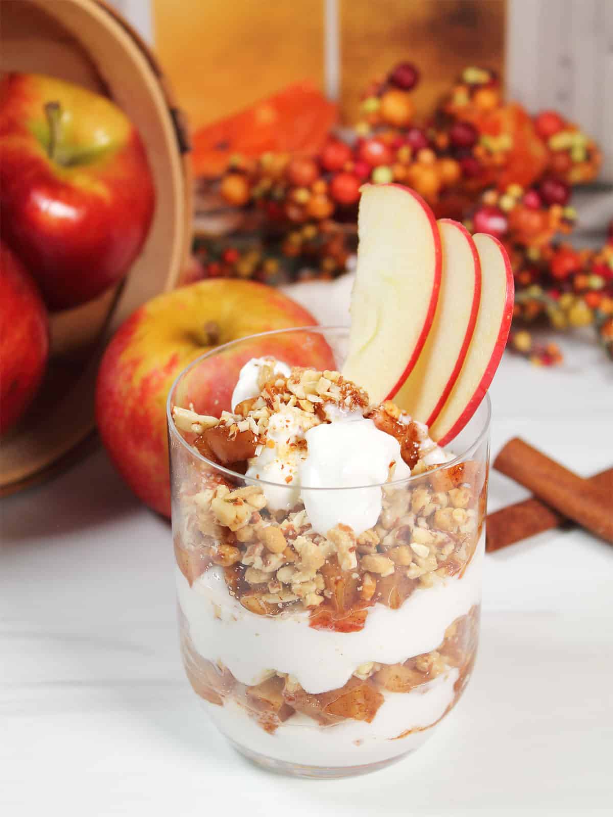 Apple Parfait with 3 sliced apples for garnish.