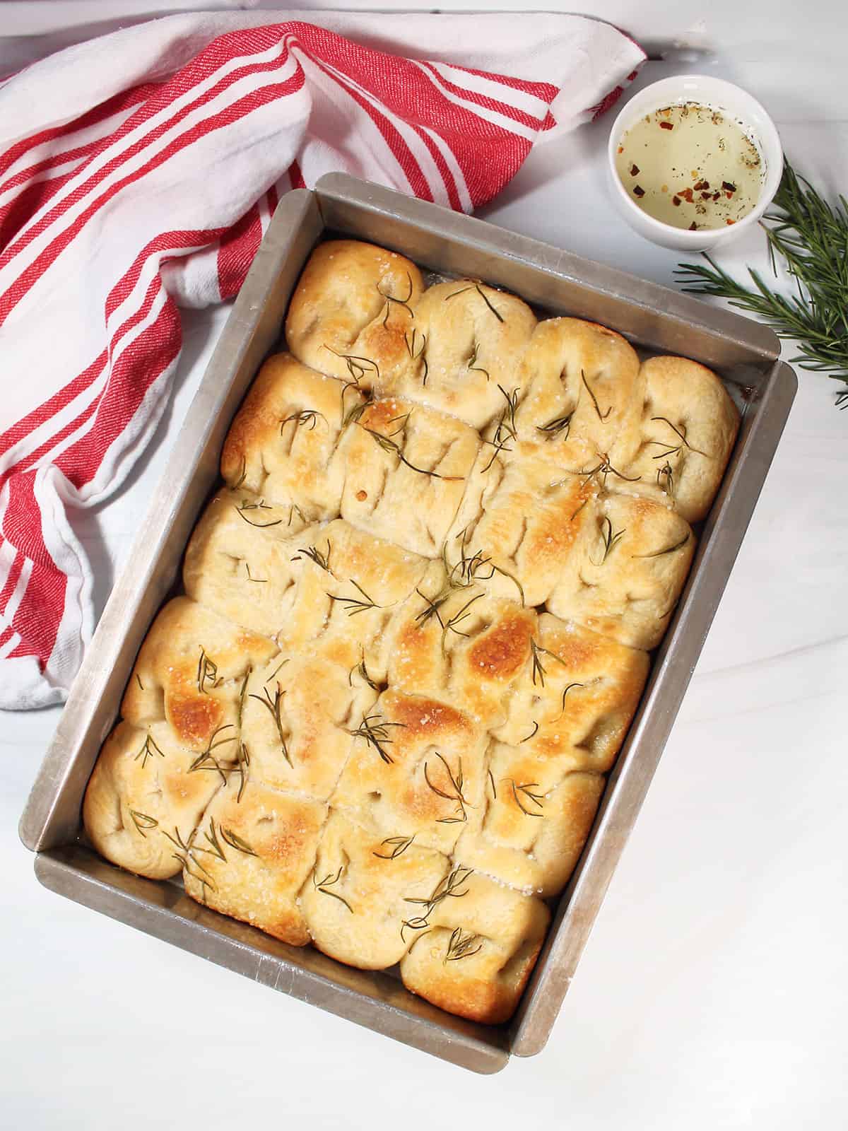 Baked golden brown focaccia bread from frozen rolls.
