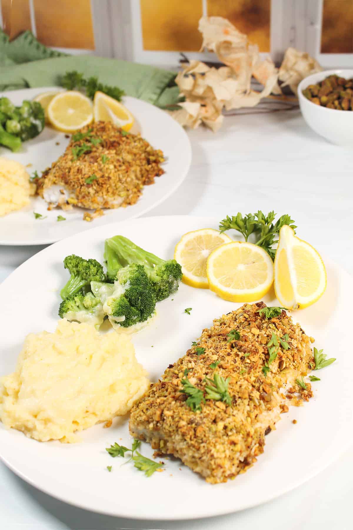 Two mahi mahi dinners with sides.