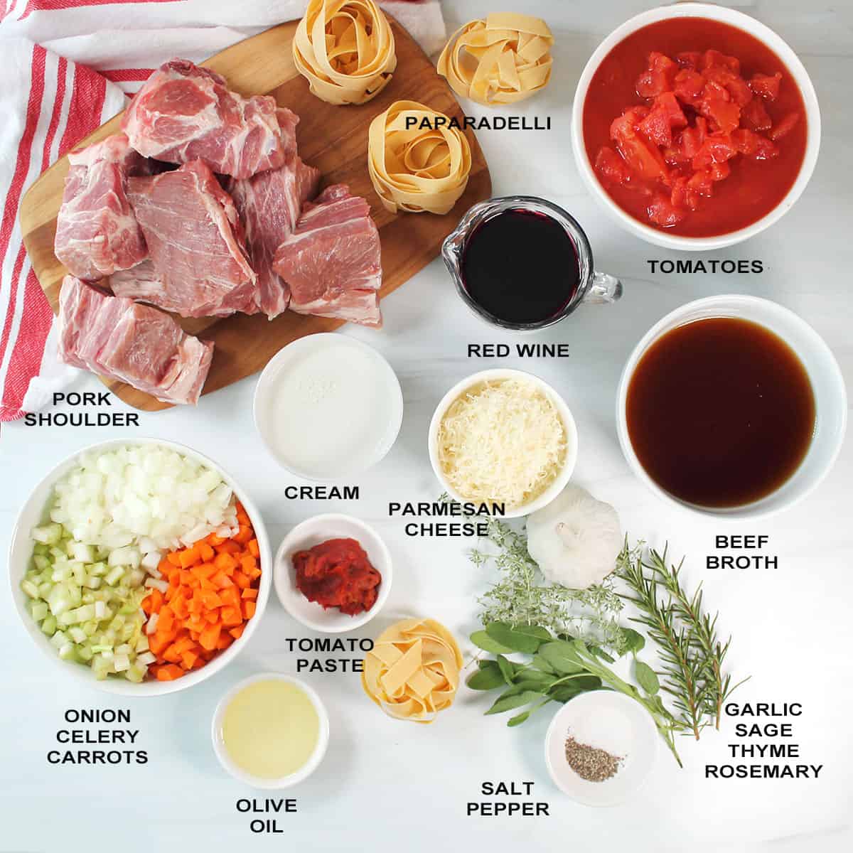 Pork ragu ingredients labeled on table.