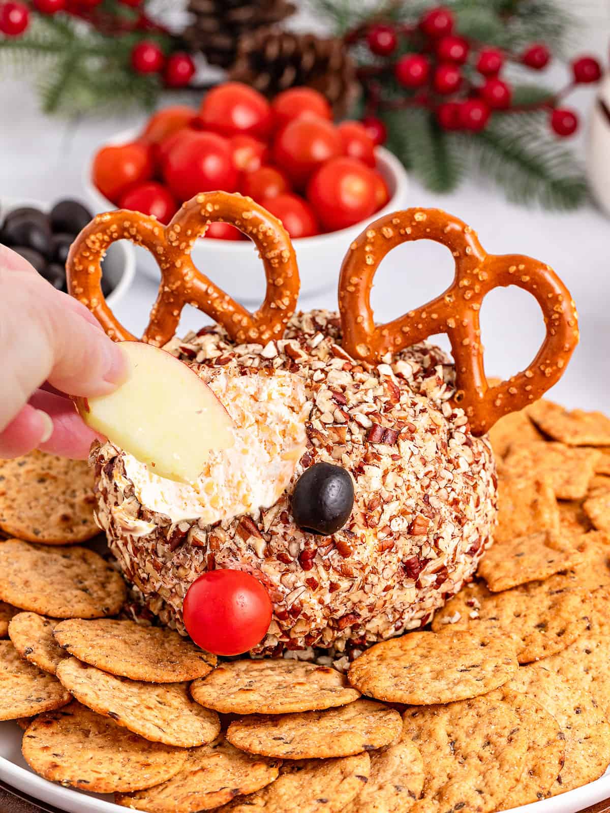 Scooping a bite of the cheese ball.