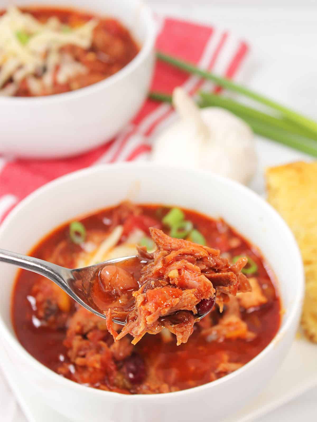 Spoonful of smoked pulled pork chili.