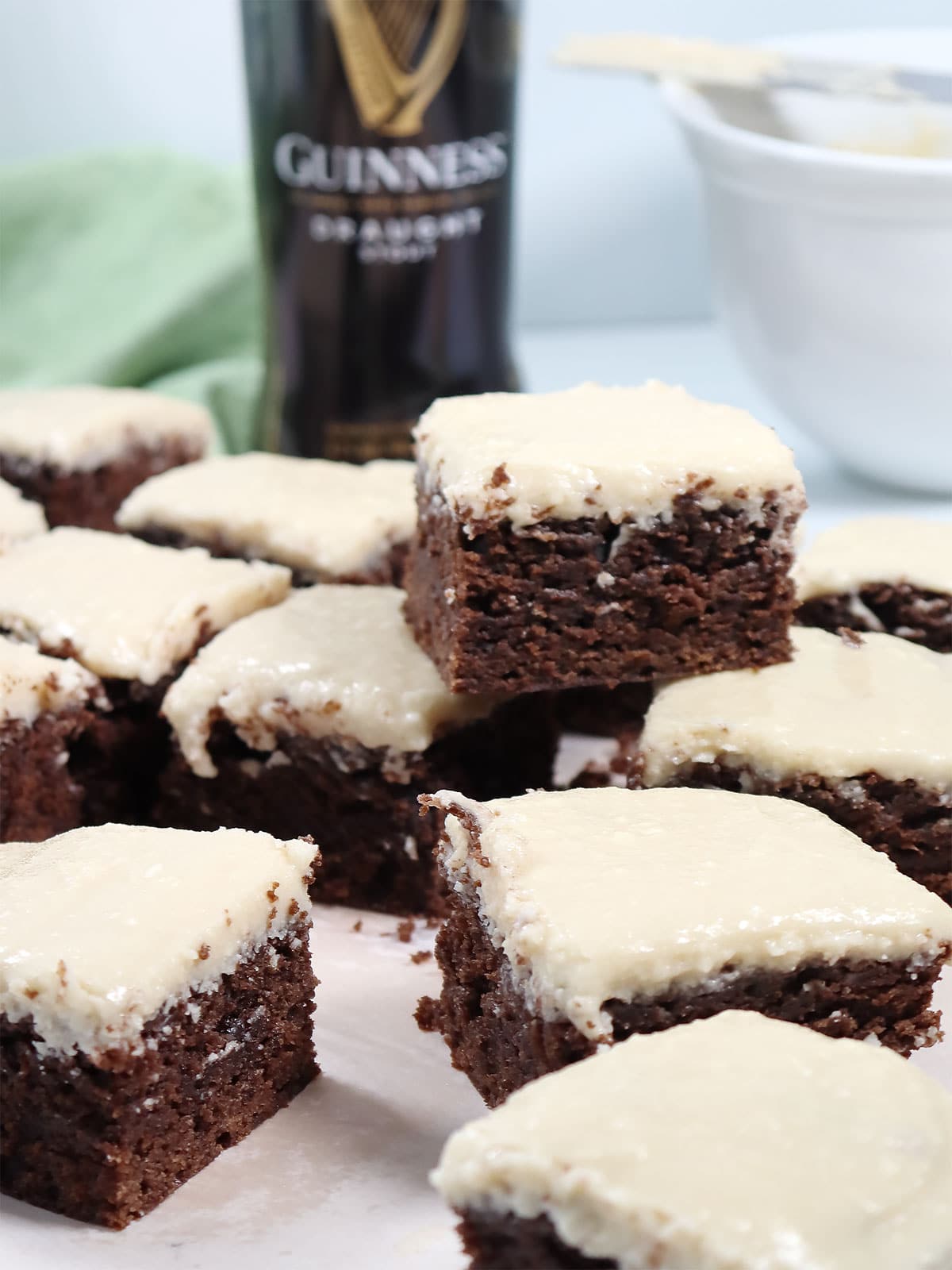 Cut brownies with buttercream frosting.