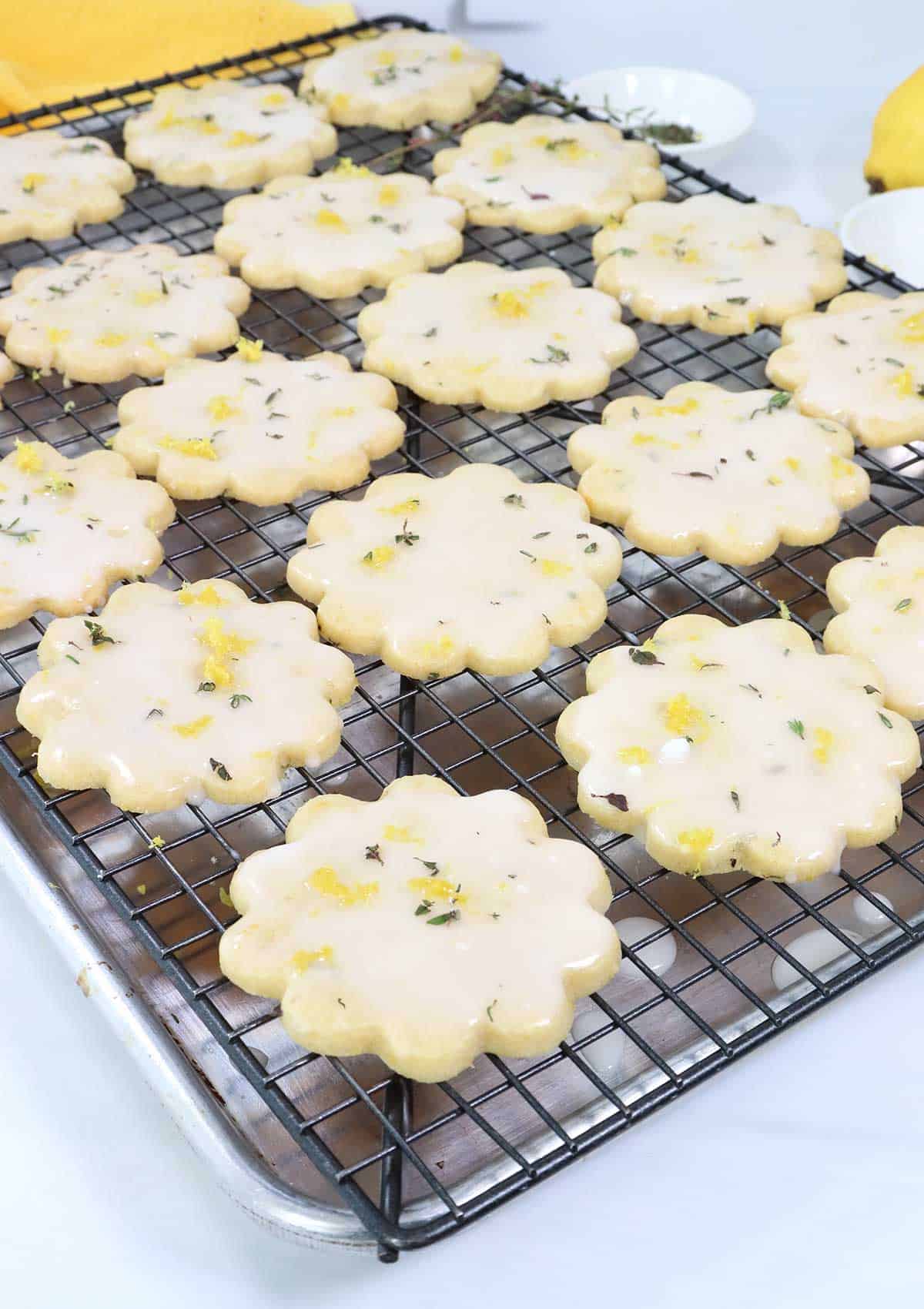 Finishing cookies with glaze and garnishes.
