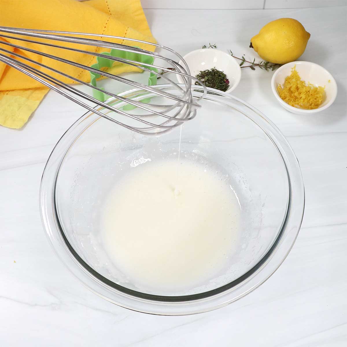 Making lemon glaze.